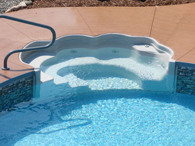 8 ft. wide radius wall pool steps plumbed with water in-let jets